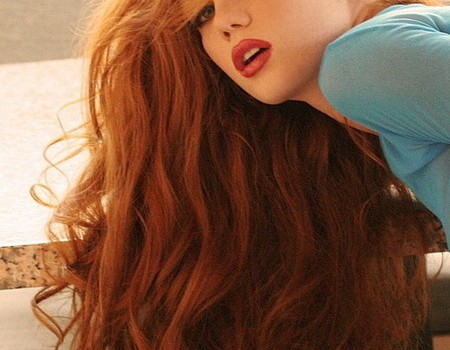 Sexy red long hair and red lips